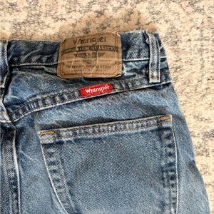 Vintage wrangler jeans, cutest amount of distressing. Sourced in NYC